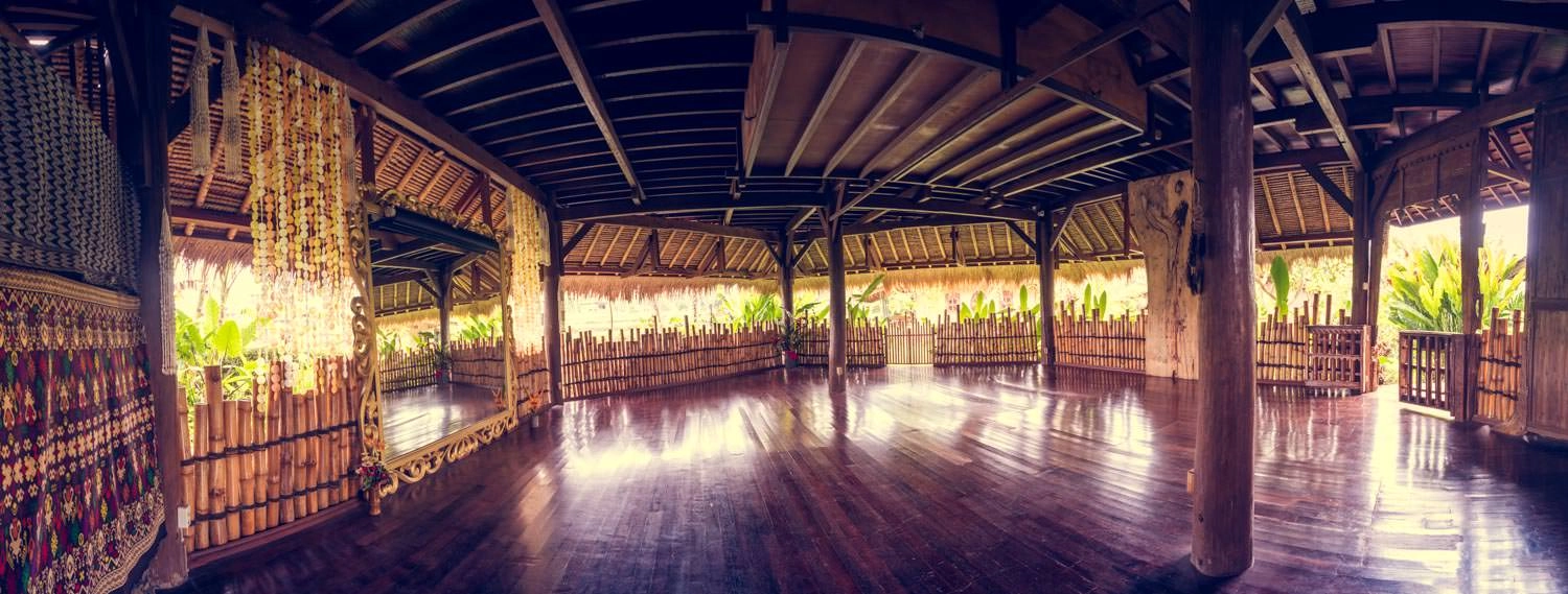 The open shala at Dragonfly Village, Bali, surrounded by rice fields